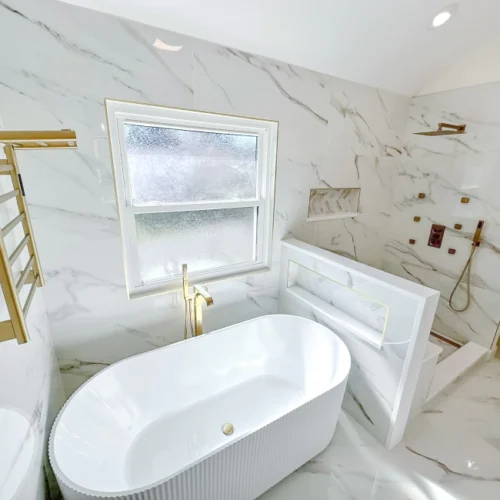 white marble themed bathroom